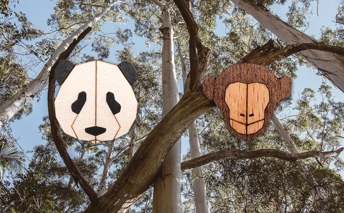 Die Affen und Panda Holzbroschen in den Tropen 